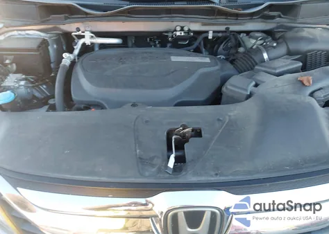 2018 Honda Odyssey Elite z USA, uszkodzony, nr VIN 5FNRL6H91JB099497